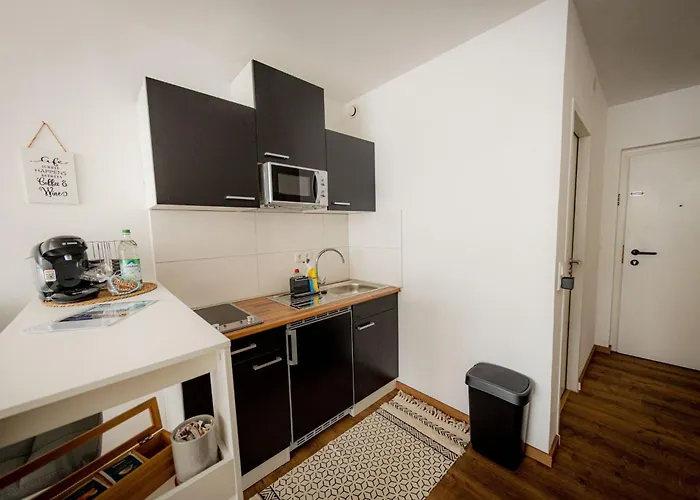 Come4stay - Modern - Parkplatz By Interhome *